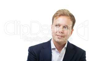 Portrait of a dreamy businessman on white background