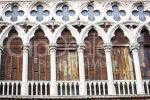 Ancient building with worn facade in Venice, Italy