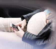 Pregnant Woman with Smartphone