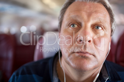 Music makes him to relax during the flight