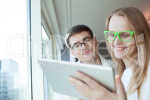 People Wearing Glasses with Tablet PC