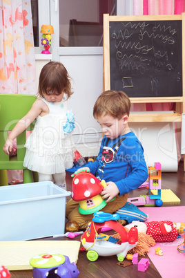 Children playing with toys at home