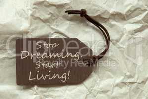 Brown Label With Quote Stop Dreaming Start Living Paper Backgrou