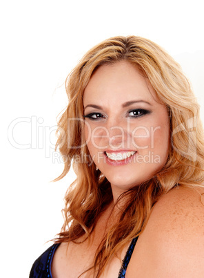 Smiling plus size blond woman.