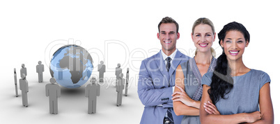 Composite image of happy business team smiling at camera