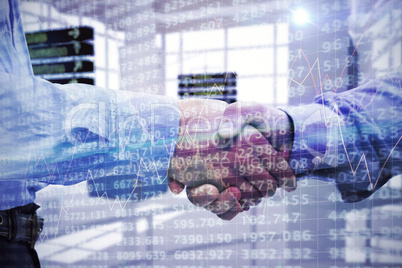 Composite image of two men shaking hands