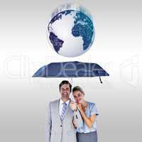 Composite image of business people holding a black umbrella