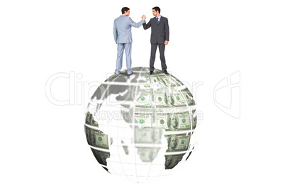 Composite image of businessmen shaking hands