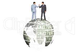 Composite image of businessmen shaking hands