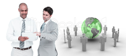 Composite image of businessmen working together