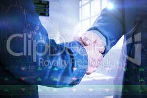 Composite image of business people shaking hands close up