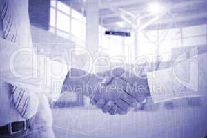 Composite image of close-up shot of a handshake in office