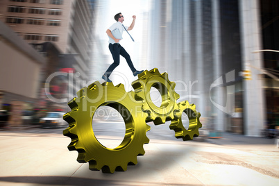 Composite image of geeky businessman running late