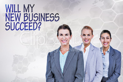 Composite image of smiling young businesswomen in a line