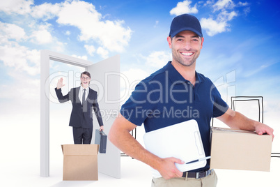 Composite image of happy delivery man with cardboard box and cli