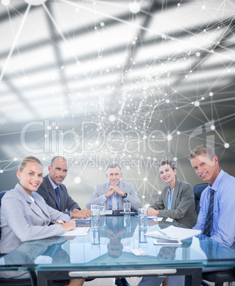 Composite image of business colleagues discussing about work