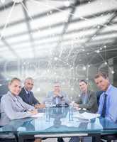 Composite image of business colleagues discussing about work