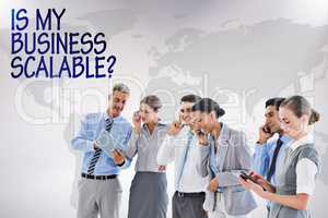 Composite image of business team all talking on phone
