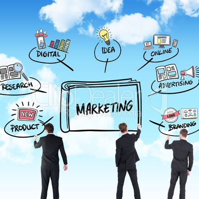 Composite image of business team writing Composite image of business team writing