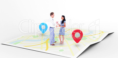 Composite image of happy business people discussing together