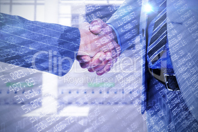 Composite image of  businessman shaking hands with a co worker