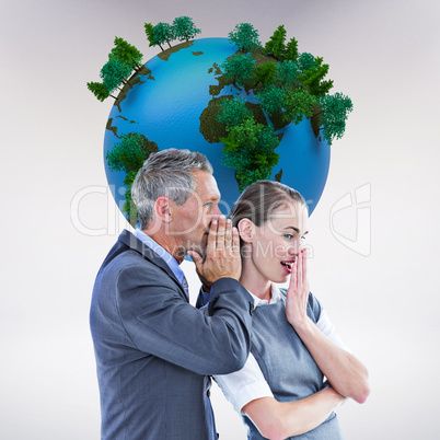 Composite image of gossiping business team