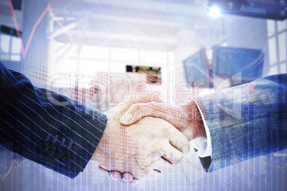 Composite image of business people shaking hands