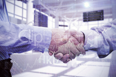 Composite image of two men shaking hands