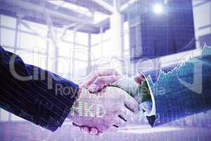 Composite image of business people shaking hands