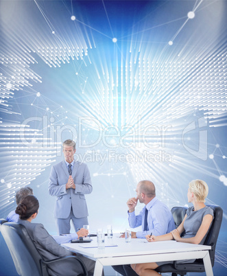 Composite image of business people listening during meeting