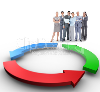 Composite image of business team looking at camera