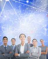 Composite image of business people looking up in office