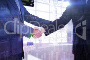 Composite image of handshake in agreement