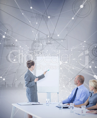 Composite image of business people looking at meeting board duri