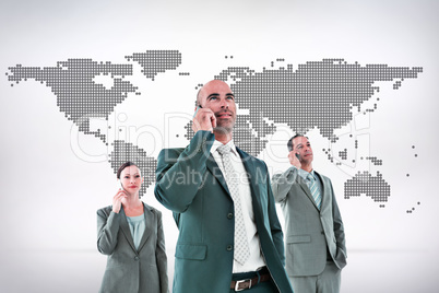 Composite image of business colleagues using phones Composite image of business colleagues using phones