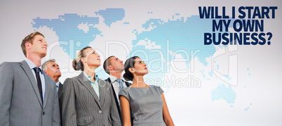 Composite image of business team looking up