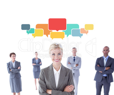 Composite image of businesswoman colleagues arm crossed