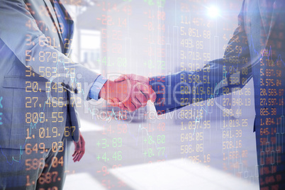 Composite image of business handshake