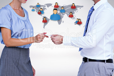 Composite image of business people exchanging business card