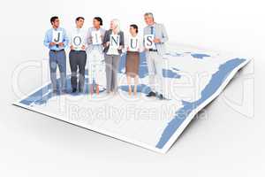 Composite image of business people holding letters sign