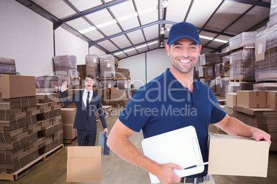 Composite image of happy delivery man with cardboard box and cli