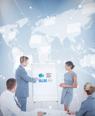 Composite image of manager presenting statistics to his colleagu