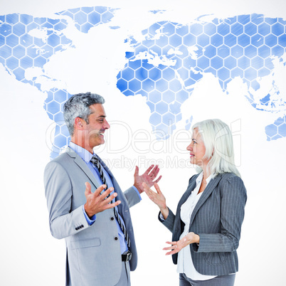 Composite image of businesswoman angry against her colleague arg