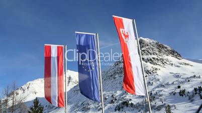 Three national flags at the border crossing in Austria