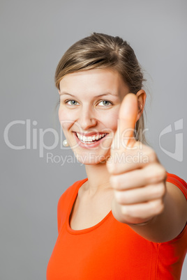 young woman thumb up