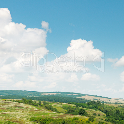 picturesque hills against the blue sky