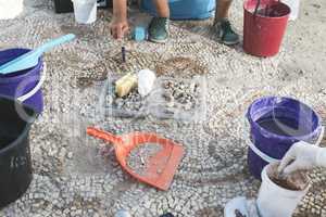 Archaeologists recover artifacts mosaic.