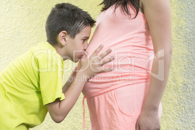 Pregnant women and small boy.