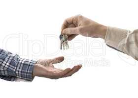 Man is handing a house key to a other man