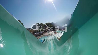 First-person view, the descent from the waterslide on holiday aqua park